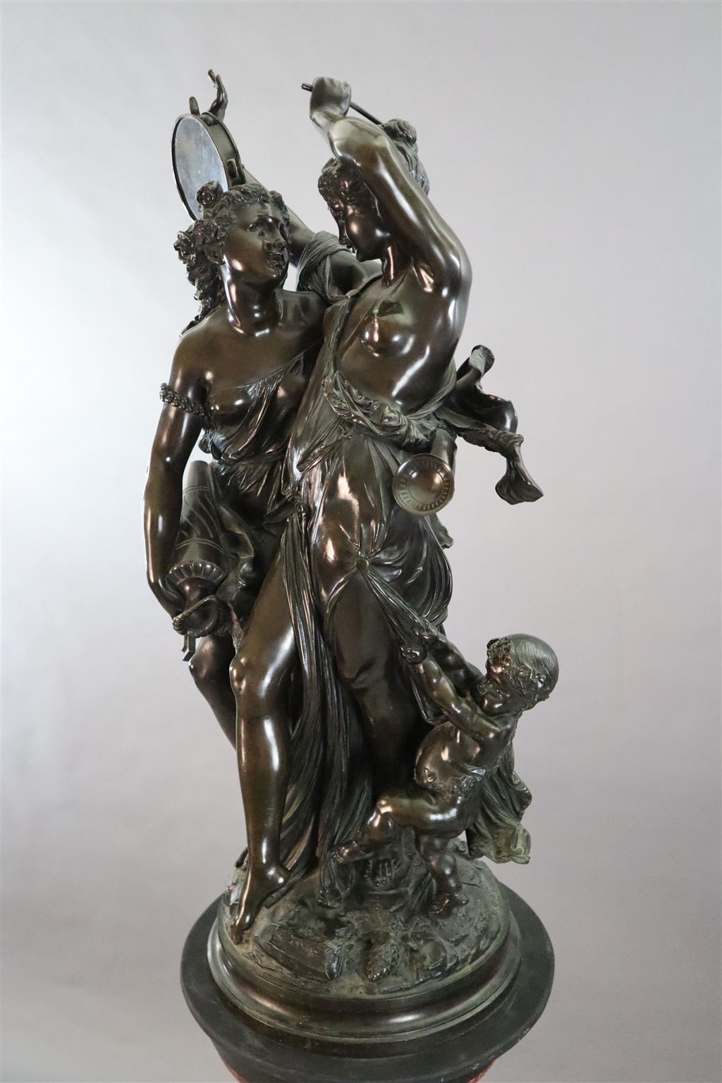 After Claude Michel Clodion (French 1738-1814). A bronze group of two Bacchantes and a putto, total height 6ft 2.5in.